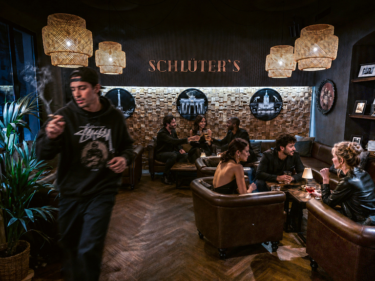 SCHLÜTER'S<br>Cigars * Cocktails * Spirits